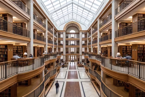Library atrium, multi-story wide hero — Landing page imagery, library/academics.